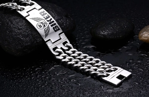 Men's titanium steel biker bracelet with skull and wings motif on black stones