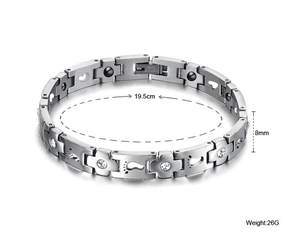 Detail view of titanium magnetic health bracelet with footprint pattern and rhinestones