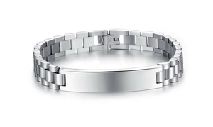 Detailed macro view of the polished silver stainless steel bracelet link and blank metal plate