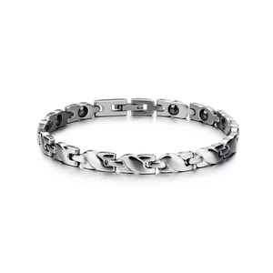 Close-up of magnetic health bracelet with black hematite stones and silver steel clasp