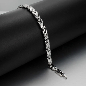 Polished silver magnetic health bracelet for women with sleek wavy streamlined links