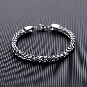Polished silver titanium steel spiga chain bracelet for men with industrial texture