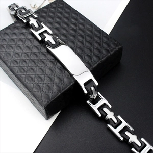 Men's fashion bracelet with silver steel plate and black silicone strap on gift box