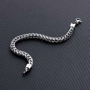 Polished silver wheat chain bracelet in titanium steel with a secure lobster clasp