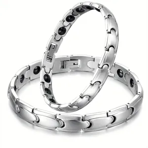 Bracciali per terapia magnetica in acciaio al titanio per coppie con maglie lucide