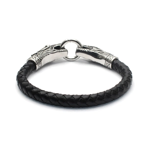 Men's Nordic Viking style black braided leather bracelet with silver wolf head ring closure