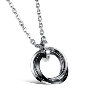 Intertwined triple ring necklace in black and silver steel with diamond accents