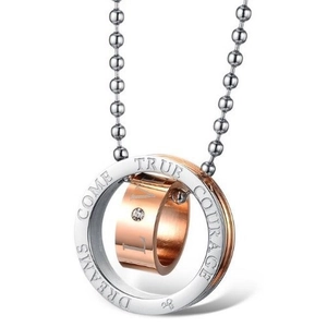 Collana bicolore in acciaio al titanio con anelli incisi e accento in zirconia oro rosa