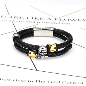 Men's punk braided leather bracelet with skull and rose metal charms and magnetic clasp