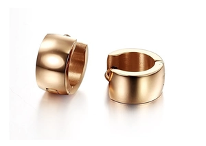 Minimalist thick rose gold huggie earrings with polished mirror finish on white background
