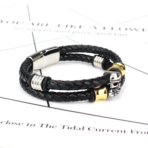 Men's punk braided leather skull bracelet with gold and silver metal accents