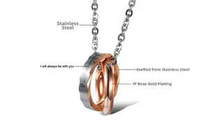 Detail of interlocking titanium rings with 'I will always be with you' engraving