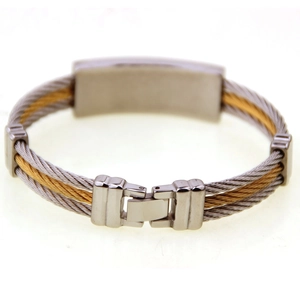 Macro shot of two-tone braided steel wire bracelet with a mechanical metal clasp
