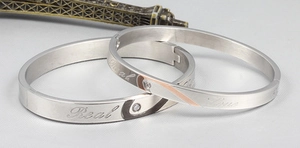 Couples titanium steel bracelets with Real Love engraving and sparkling crystal accents