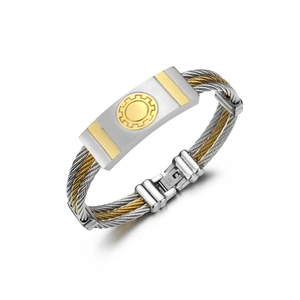 Detail of two-tone braided stainless steel cable bracelet with industrial metal plate