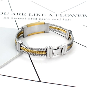Two-tone woven stainless steel cable bracelet with polished gold and silver metal bar