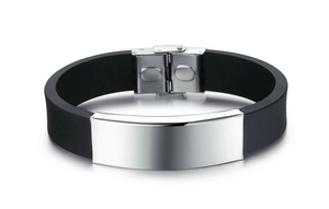 Detail of black silicone ID bracelet with polished metal plate and folding clasp