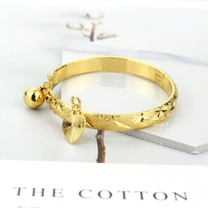 Kids 18K gold plated bangle with star texture, heart pendant and small bell charm