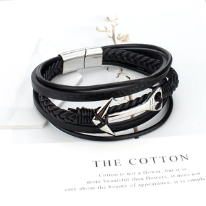 Multi-layer braided leather bracelet for men featuring a silver anchor charm and magnetic clasp