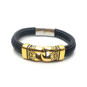 Men's braided black leather bracelet with vintage gold metal charm and magnetic clasp