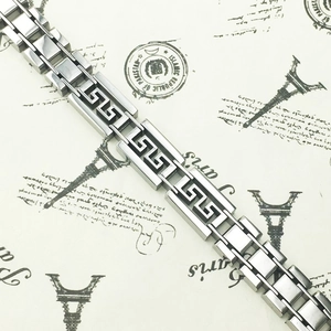Bold stainless steel men's bracelet with Greek key pattern and industrial chain links