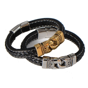 Detailed view of woven leather bracelets with engraved metallic magnetic clasps