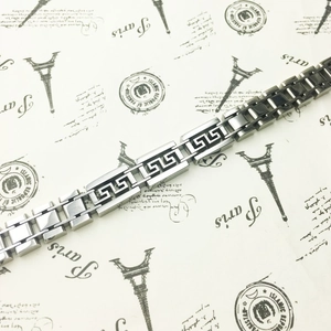 Polished silver titanium steel bracelet for men with classic Greek key pattern