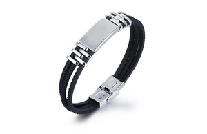 Detail of multi-layer silicone bracelet with silver curved metal plate and buckle