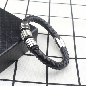 Men's minimalist black braided leather bracelet with silver stainless steel magnetic clasp