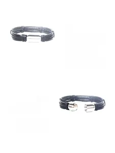 Detail of men's braided black leather bracelet with silver magnetic buckle in open and closed state