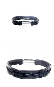 Detail of multi-layer black braided leather bracelet for men with silver metal buckle