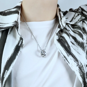 Minimalist silver interlocking double ring necklace with LOVE engraving for couples