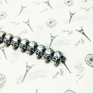 Punk style silver stainless steel skull link bracelet for men with polished mirror finish