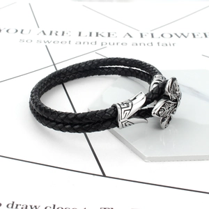 Punk black braided leather bracelet for men featuring vintage silver textured metal clasp