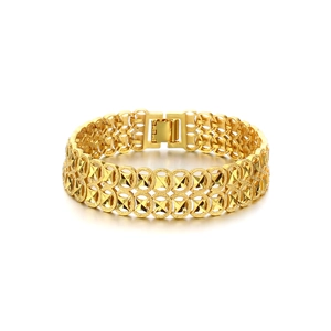 Macro detail of 18K gold plated wide hollow geometric link bracelet with folding clasp