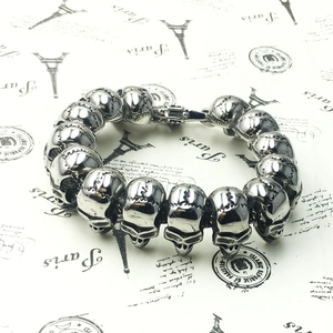 Gothic style skull link bracelet in polished stainless steel with spring clasp