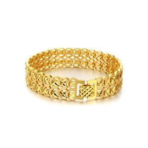 Detail of 18K gold plated wide bracelet featuring hollow coin patterns and clasp