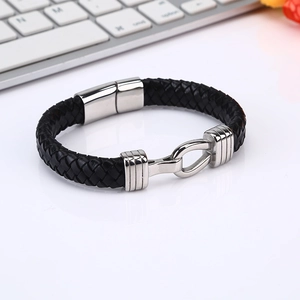 Black braided leather men's bracelet featuring a silver stainless steel magnetic hook clasp