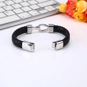 Minimalist black braided leather bracelet for men featuring a silver stainless steel clasp