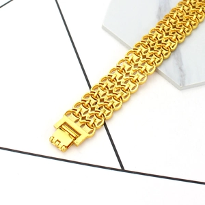 Men's wide gold chain bracelet with hollow industrial mesh design and folding safety clasp
