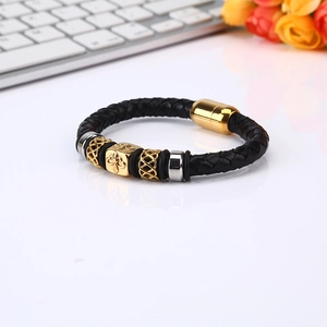 Men's braided black leather bracelet with gold cross motif and magnetic clasp