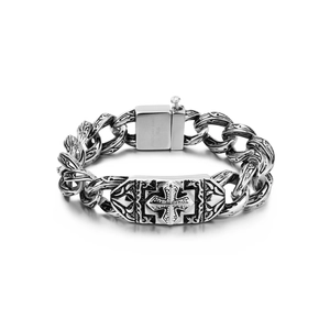 Detailed close-up of 316L stainless steel bracelet with engraved gothic cross patterns