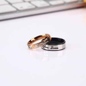 Minimalist titanium steel couple rings with True Love engraving and polished finish