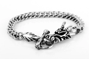 Detailed view of punk dragon head titanium steel bracelet with a vintage toggle clasp