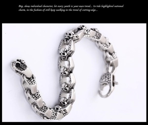 Macro view of punk skull link bracelet with vintage stainless steel texture and lobster clasp