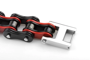 Detail of red and black industrial motor chain bracelet with silver polished metal buckle