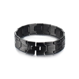 Detail of black titanium steel link bracelet with matte and polished finish textures