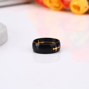 Polished black stainless steel ring with a golden cross inlay for men and women