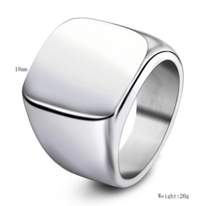 Detailed macro view of an 18mm wide square signet ring for men in polished steel