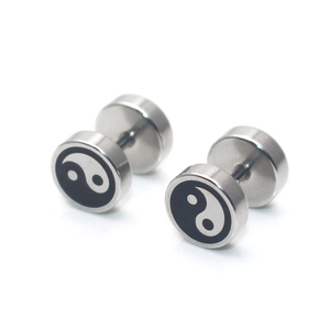 Macro view of silver stainless steel barbell earrings featuring Tai Chi Yin Yang symbols